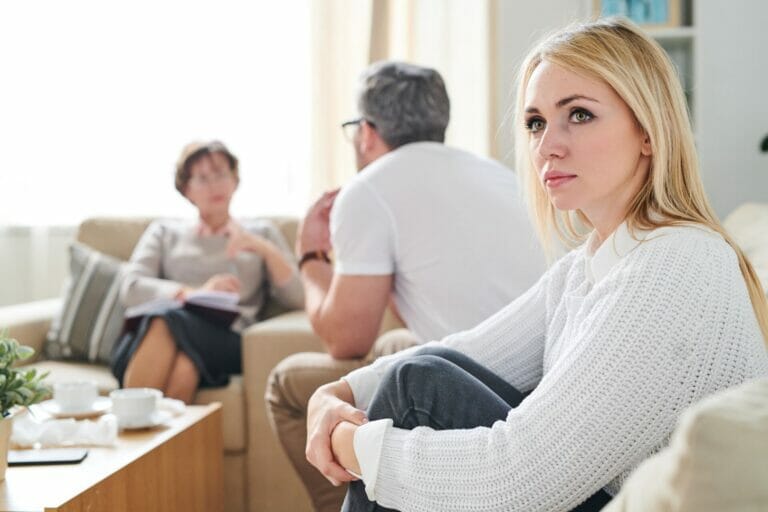 Sad thoughtful wife at therapy session